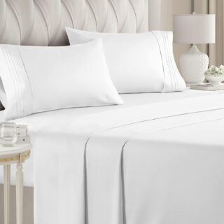 CGK Unlimited white sheet set shown on a bed